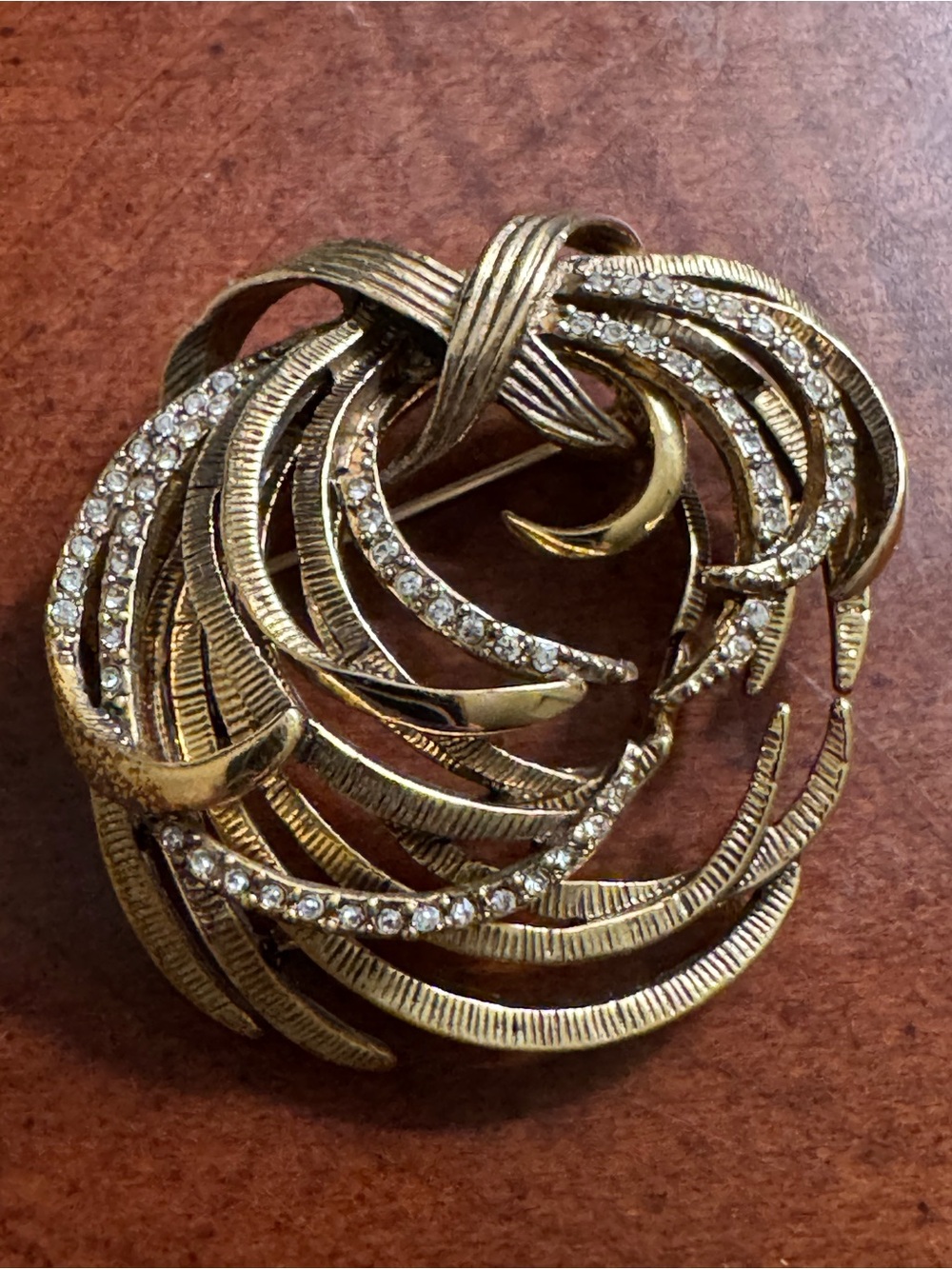 Monet Gold Crystal Swirl Brooch - Elegant Women's Jewelry